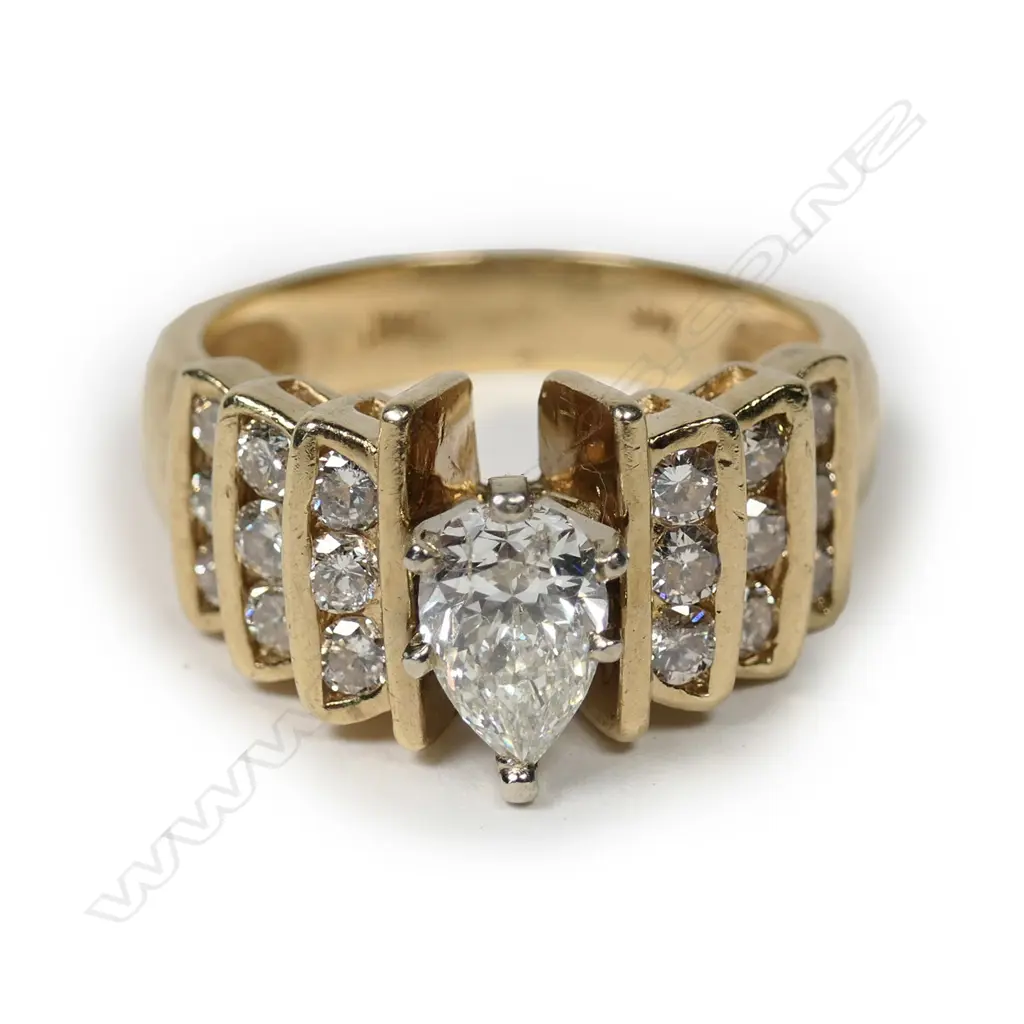 A stylish retro 14k gold and solitaire diamond ring Image 1++