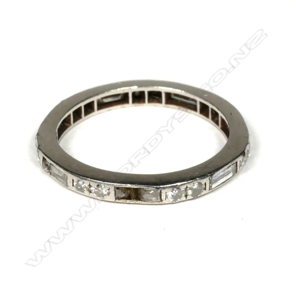 A vintage platinum and diamond eternity band ring Image 1++