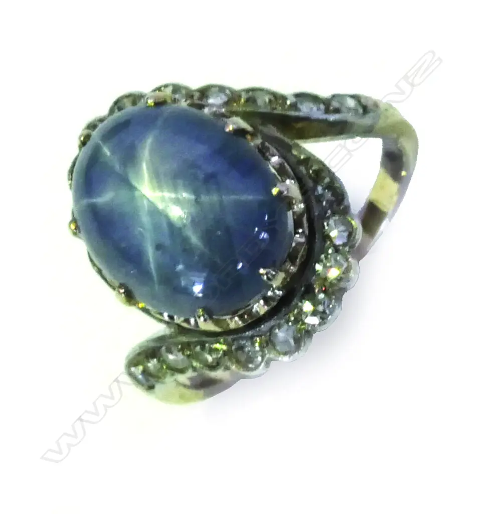A vintage star sapphire and diamond estate cluster ring Image 1++