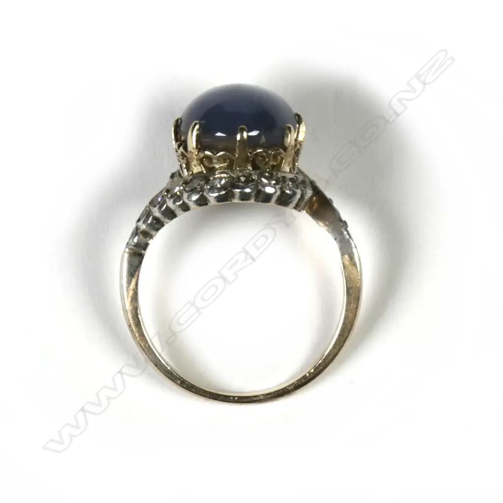 A vintage star sapphire and diamond estate cluster ring Image 1++