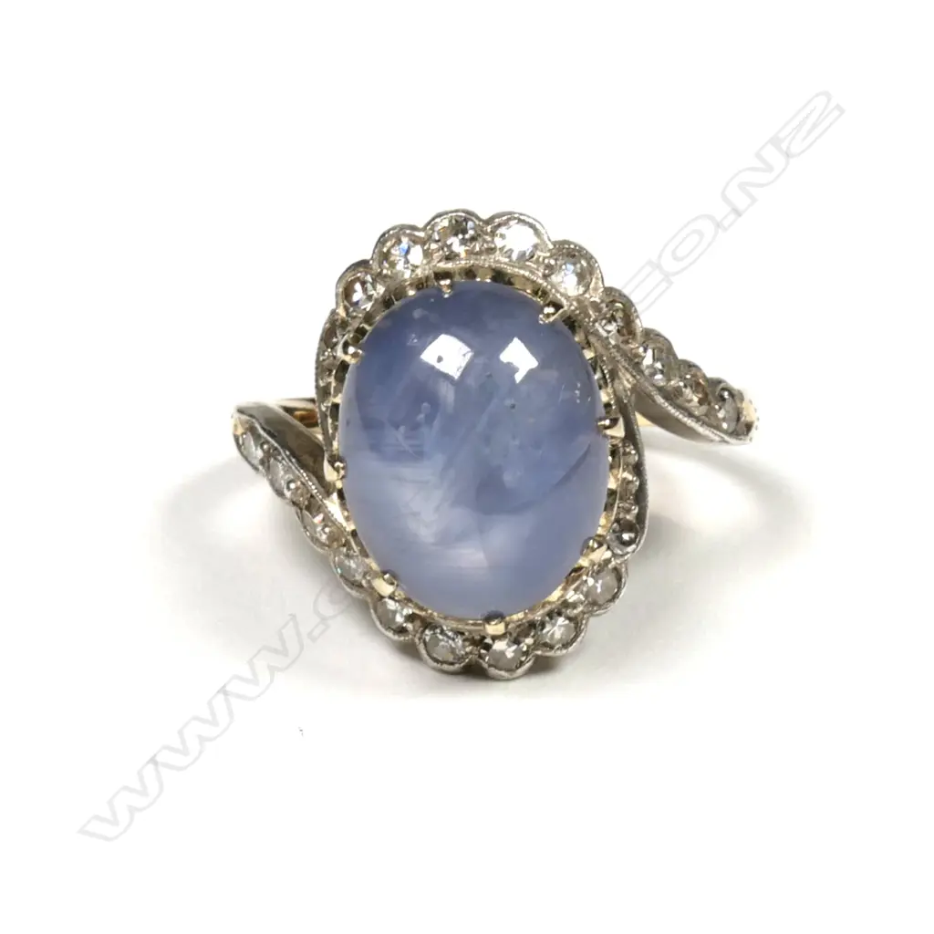 A vintage star sapphire and diamond estate cluster ring Image 1++