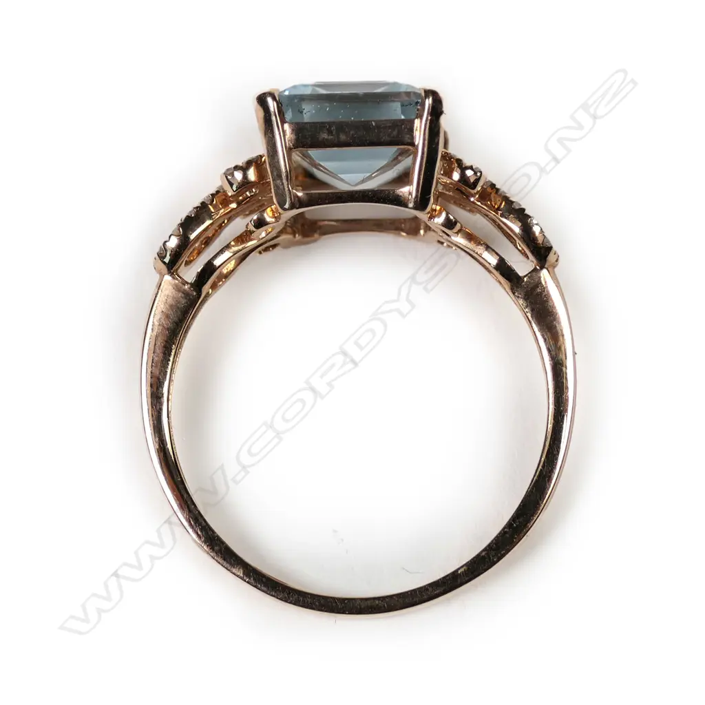 A 14k rose gold aquamarine and diamond ring Image 1++