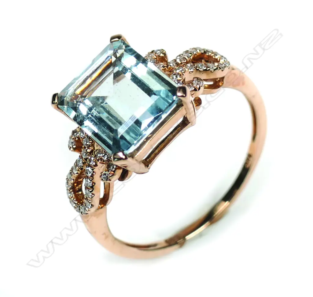A 14k rose gold aquamarine and diamond ring Image 1++