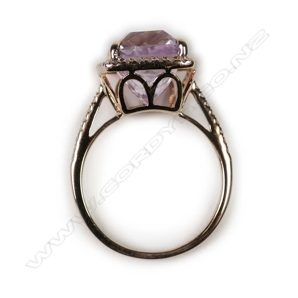 A 14k rose gold kunzite and diamond ring Image 1++