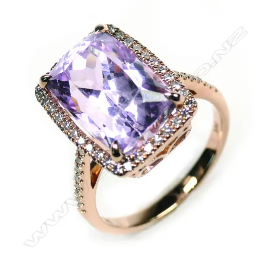 A 14k rose gold kunzite and diamond ring