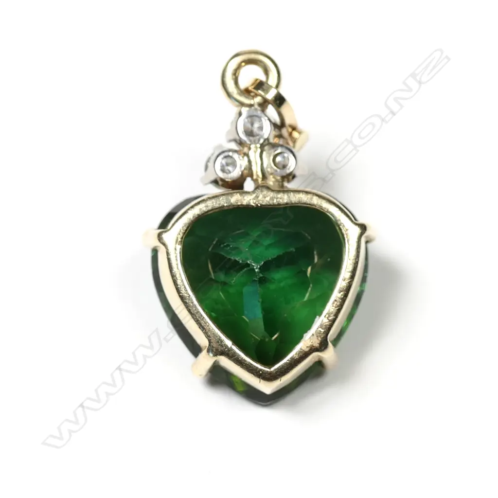 A 9ct green tourmaline and diamond pendant Image 1++