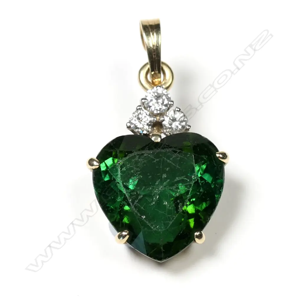A 9ct green tourmaline and diamond pendant Image 1++