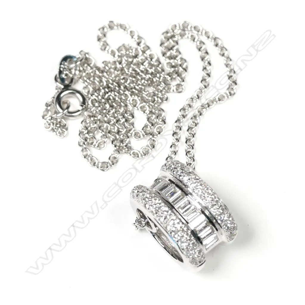 An 18ct white gold diamond pendant on chain Image 1++