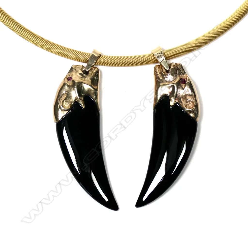 A vintage18ct gold and 9ct gold necklace Image 1++