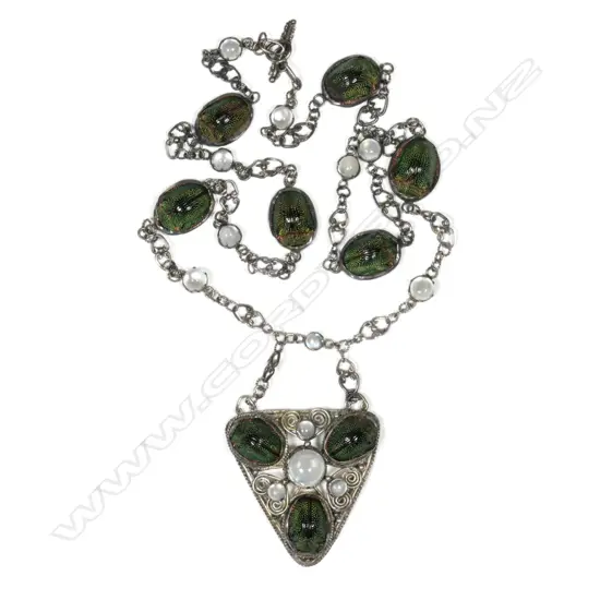 A silver Arts and Crafts scarab beetle and moonstone necklace
