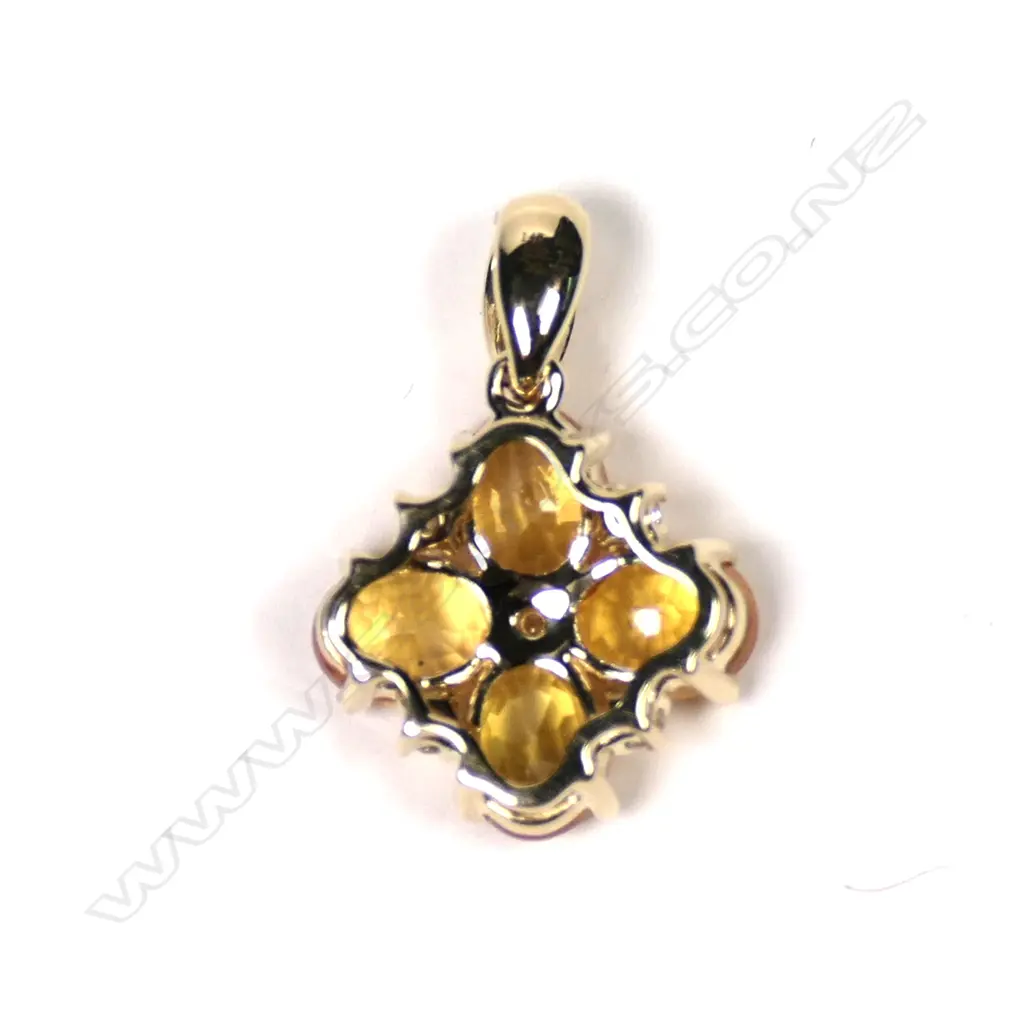 A 14ct gold Ceylonese sapphire and diamond pendant Image 1++