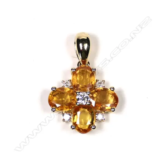 A 14ct gold Ceylonese sapphire and diamond pendant