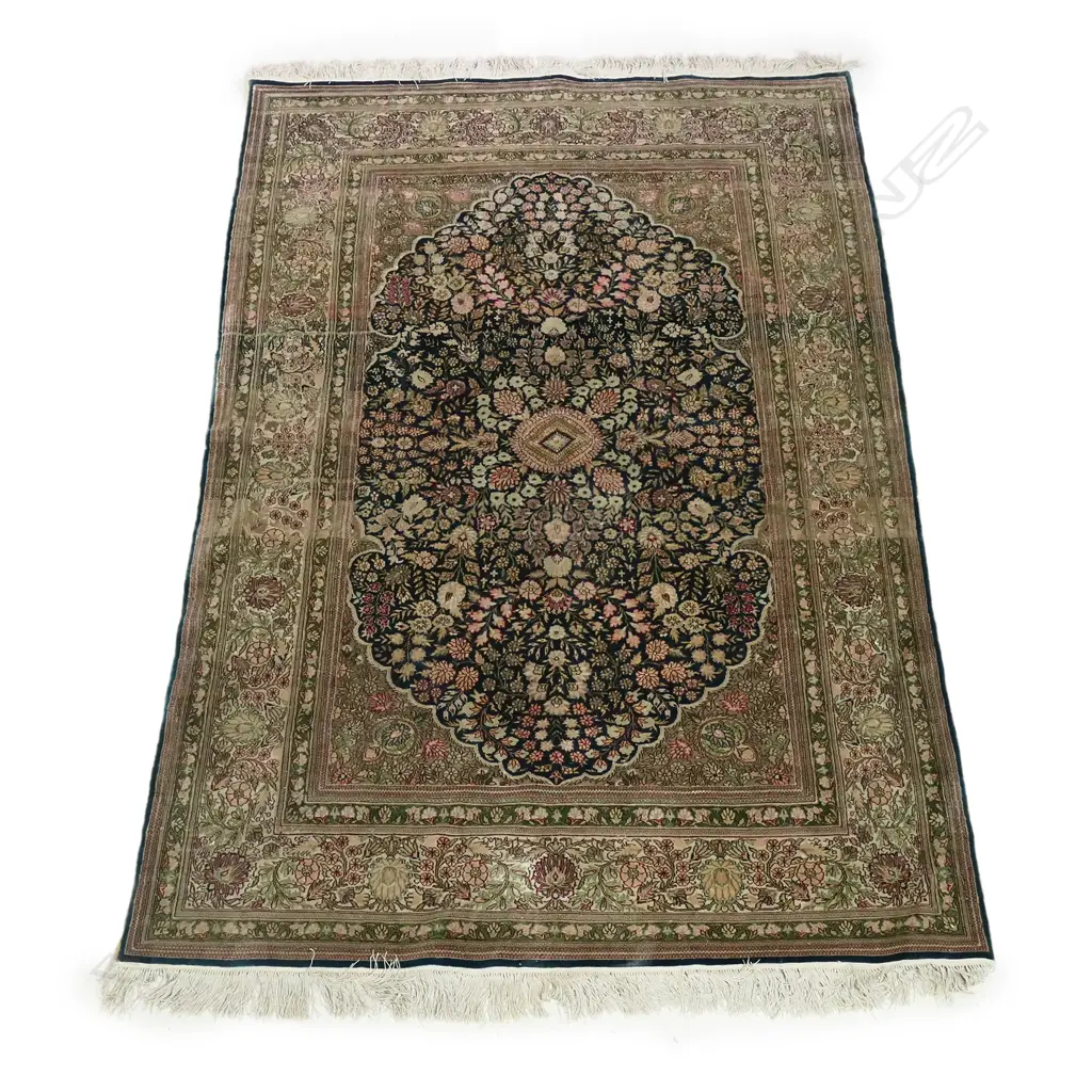 An all-silk hand knotted Qum rug Image 1++