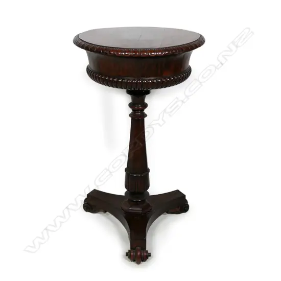 A rare telescopic lidded William IV rosewood circular teapoy