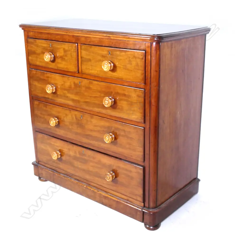 A Victorian mahogany five drawer chest Image 1++