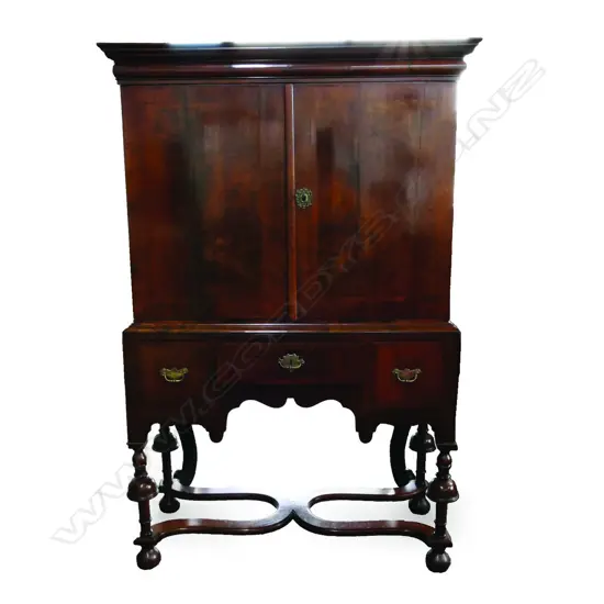 A Queen Anne style walnut cabinet on stand