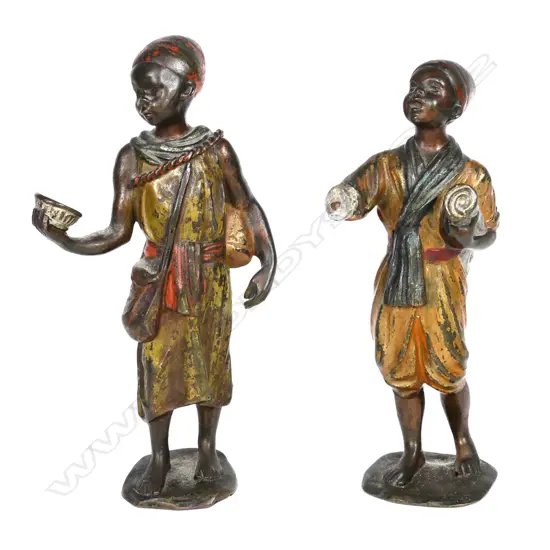 Two small cold painted bronze figures of Arab boys