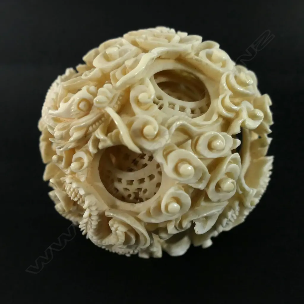 An early 20thC Chinese tall carved ivory figured stand puzzle ball Image 1++
