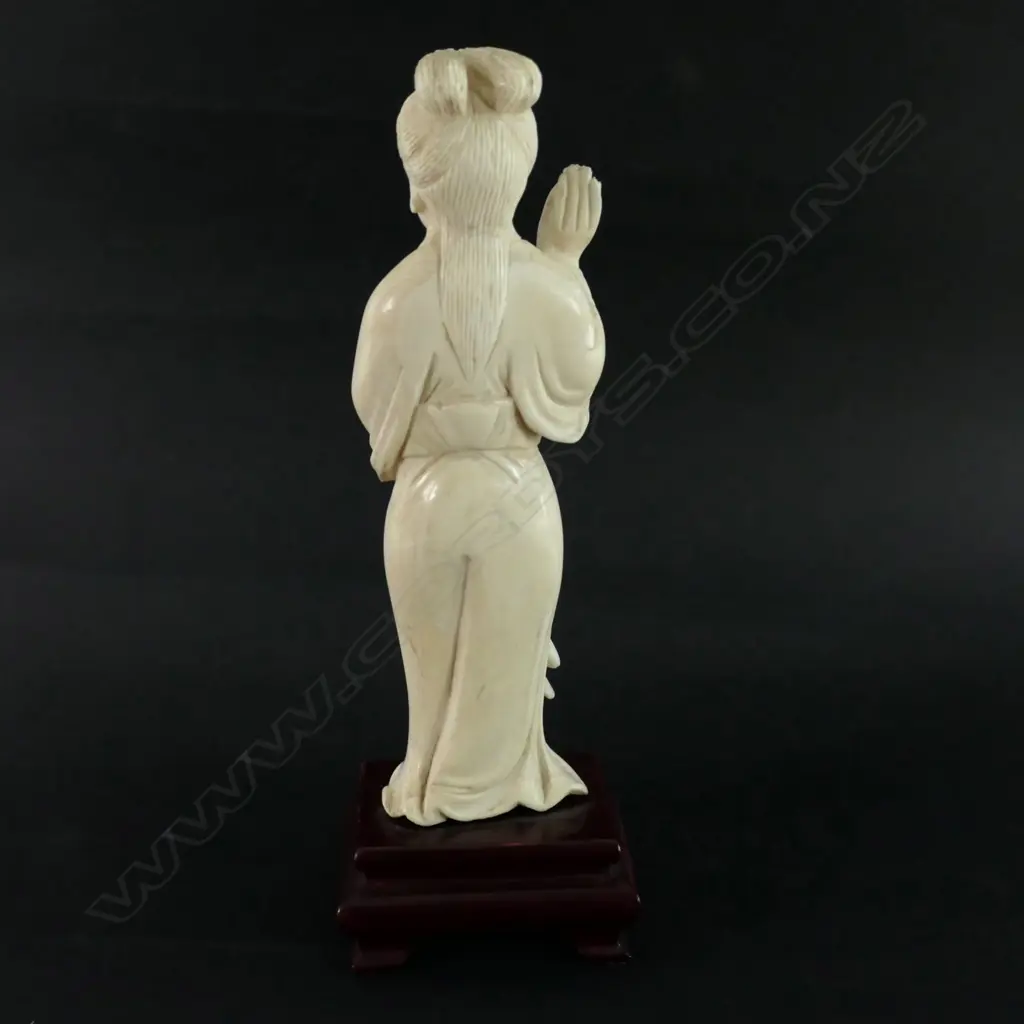An oriental carved ivory standing woman carving Image 1++