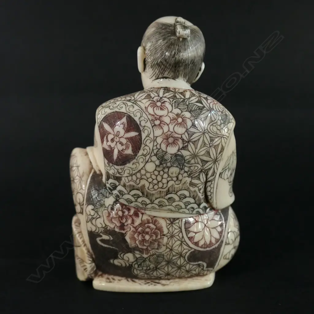 A Japanese ivory carving of a basket maker Image 1++