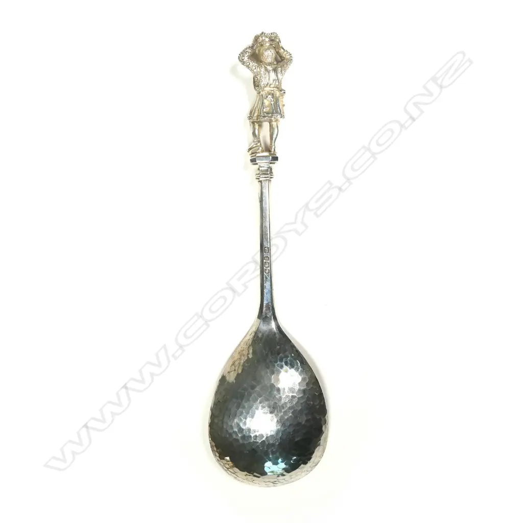 A serving spoon with figured finial Image 1++