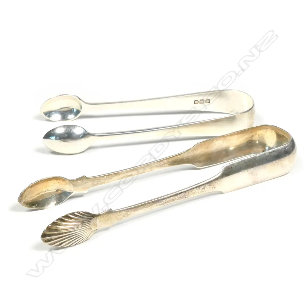Two pair of silver sugar tongs Image 1++