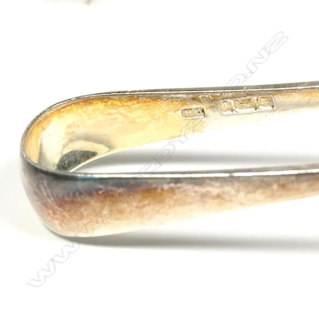 Five Edwardian silver individual asparagus tongs Image 1++