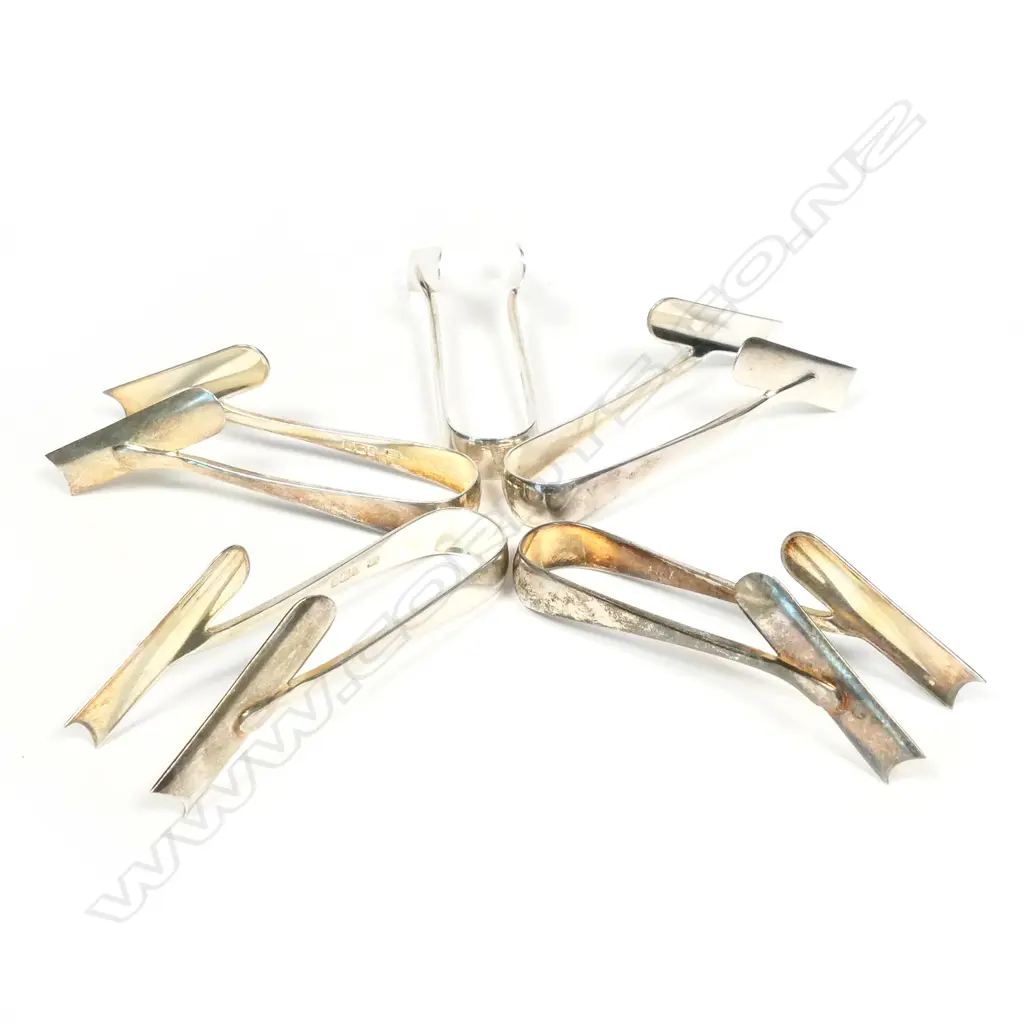 Five Edwardian silver individual asparagus tongs Image 1++