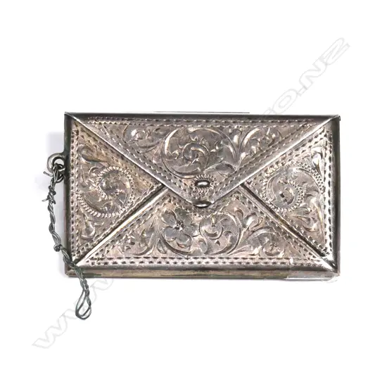 An Edwardian silver stamp holder