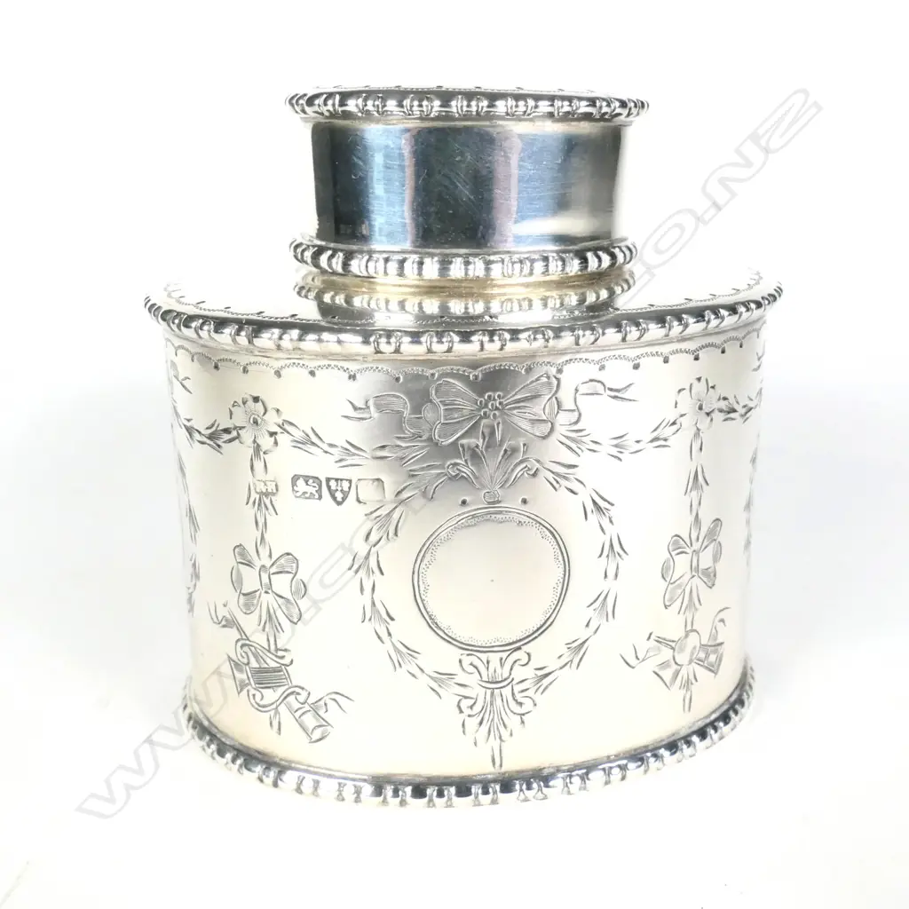 An early 1900s silver tea caddy Image 1++