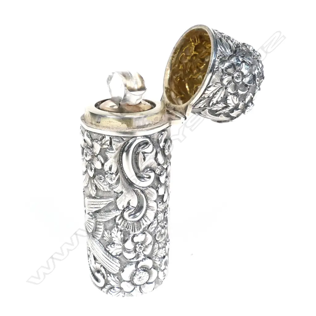 A Victorian silver cased perfume bottle Image 1++