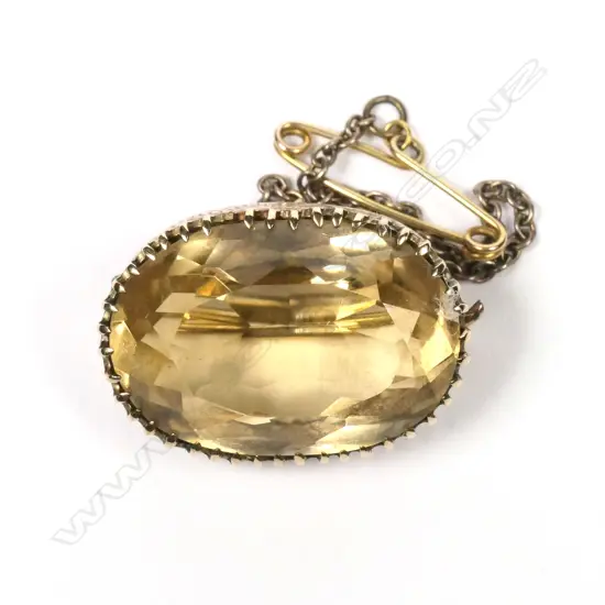 A 9ct gold and citrine brooch