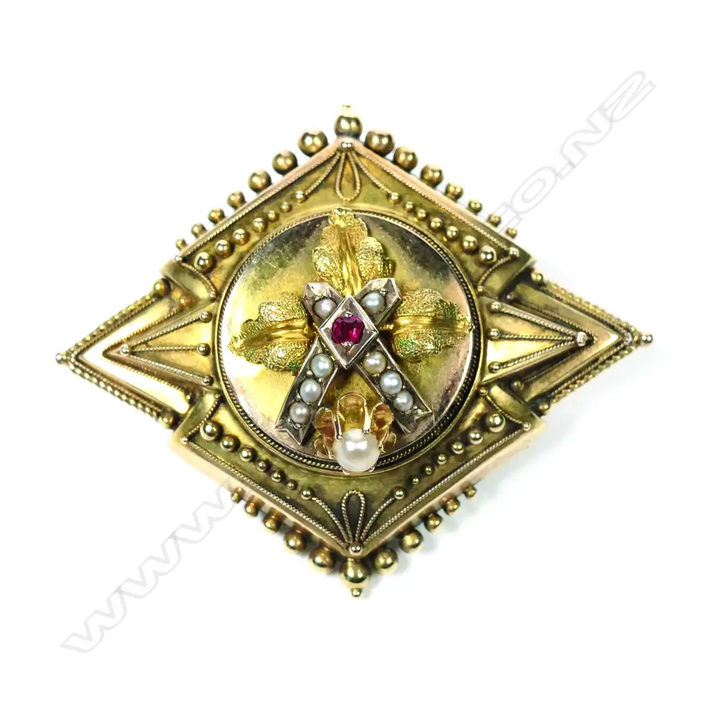 A Victorian gold pearl and ruby brooch Image 1++