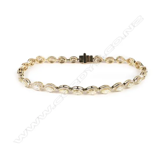 A 14ct gold diamond bracelet