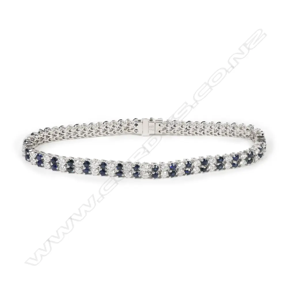 A 14ct white gold sapphire and diamond bracelet Image 1++