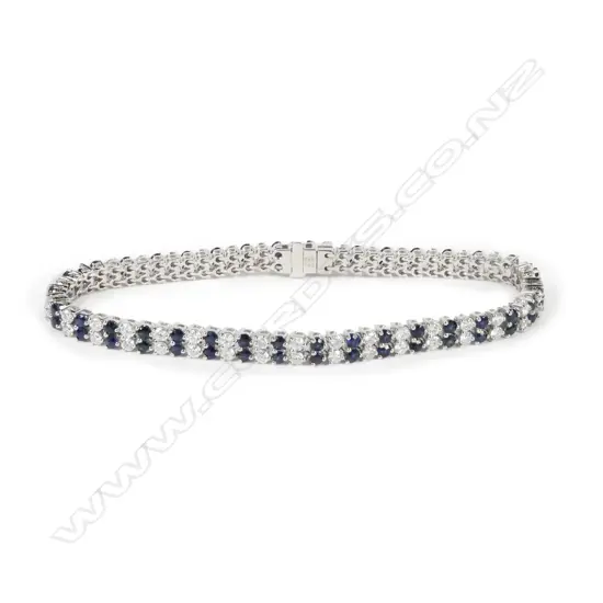 A 14ct white gold sapphire and diamond bracelet