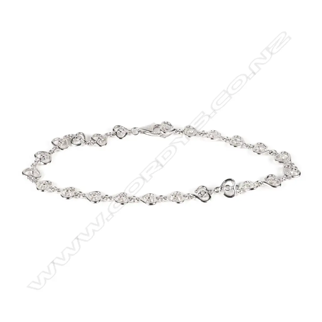 An 18ct white gold and diamond bracelet Image 1++