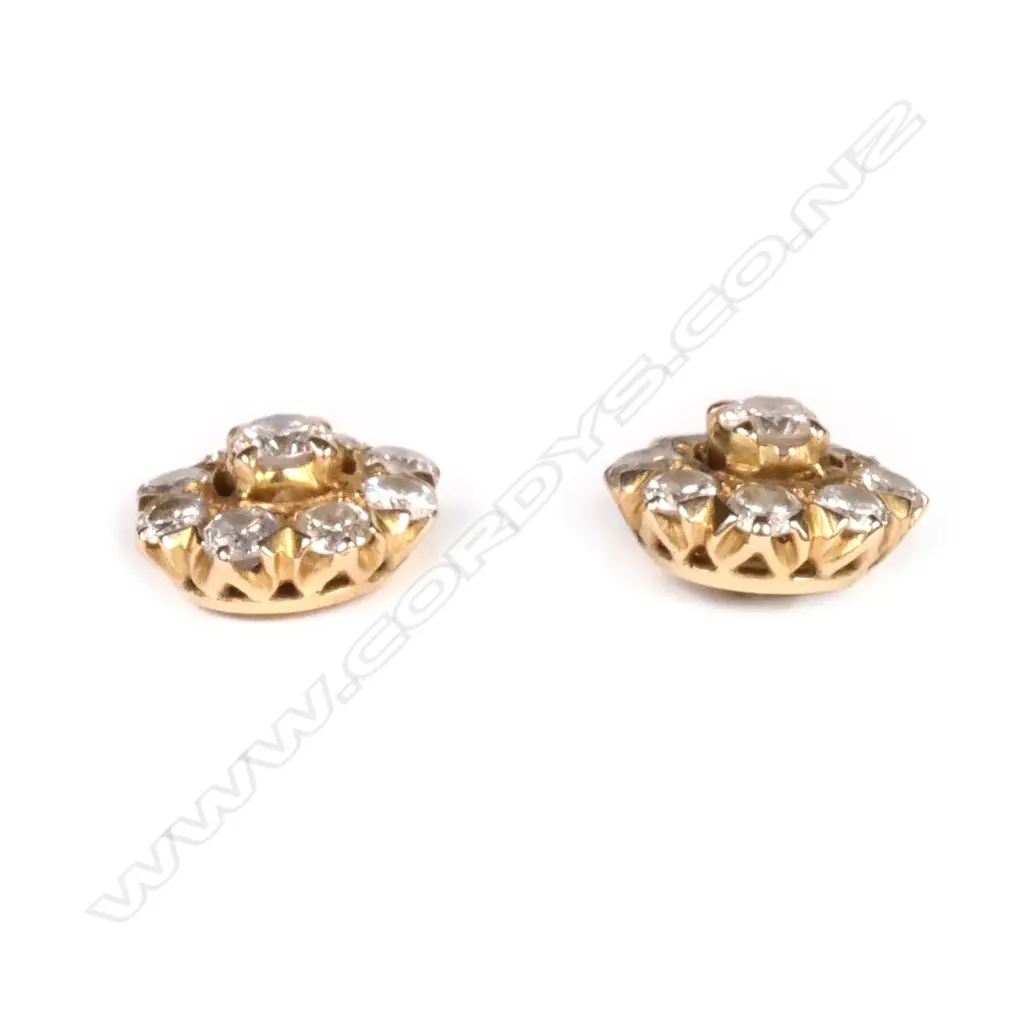 A pair of 14ct gold and diamond cluster earrings Image 1++