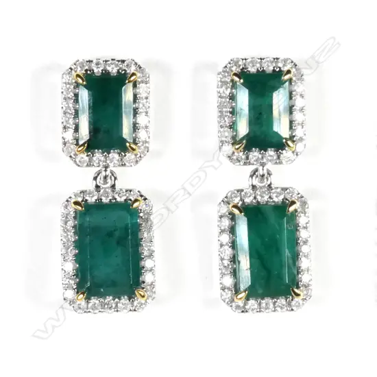 A pair of 14ct white gold emerald and diamond drop earrings
