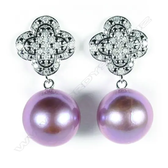 A pair of 14ct white gold pearl and diamond drop earrings