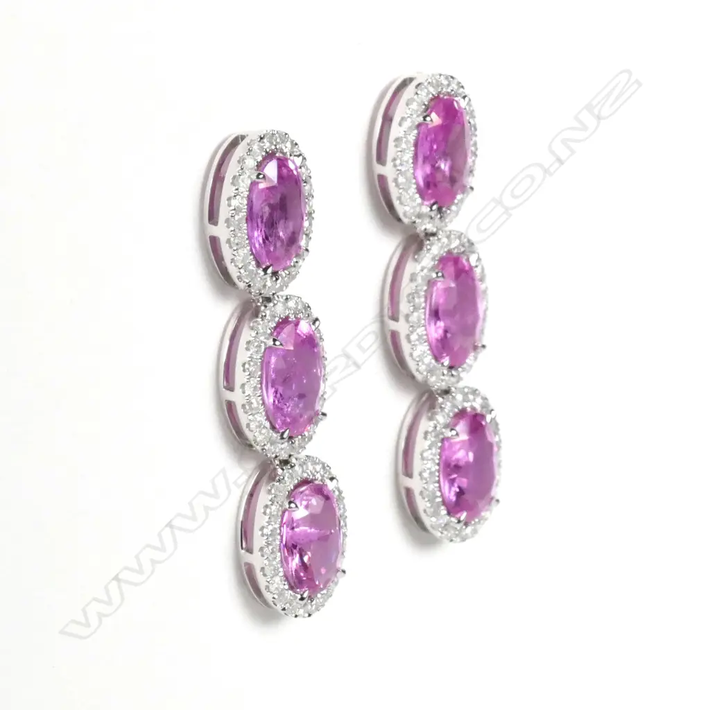 A pair of 14ct white gold sapphire and diamond drop earrings Image 1++
