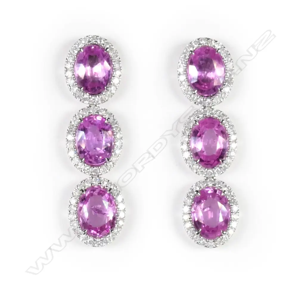 A pair of 14ct white gold sapphire and diamond drop earrings Image 1++