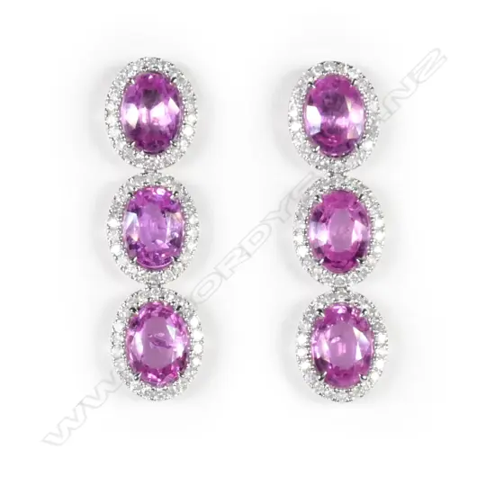 A pair of 14ct white gold sapphire and diamond drop earrings