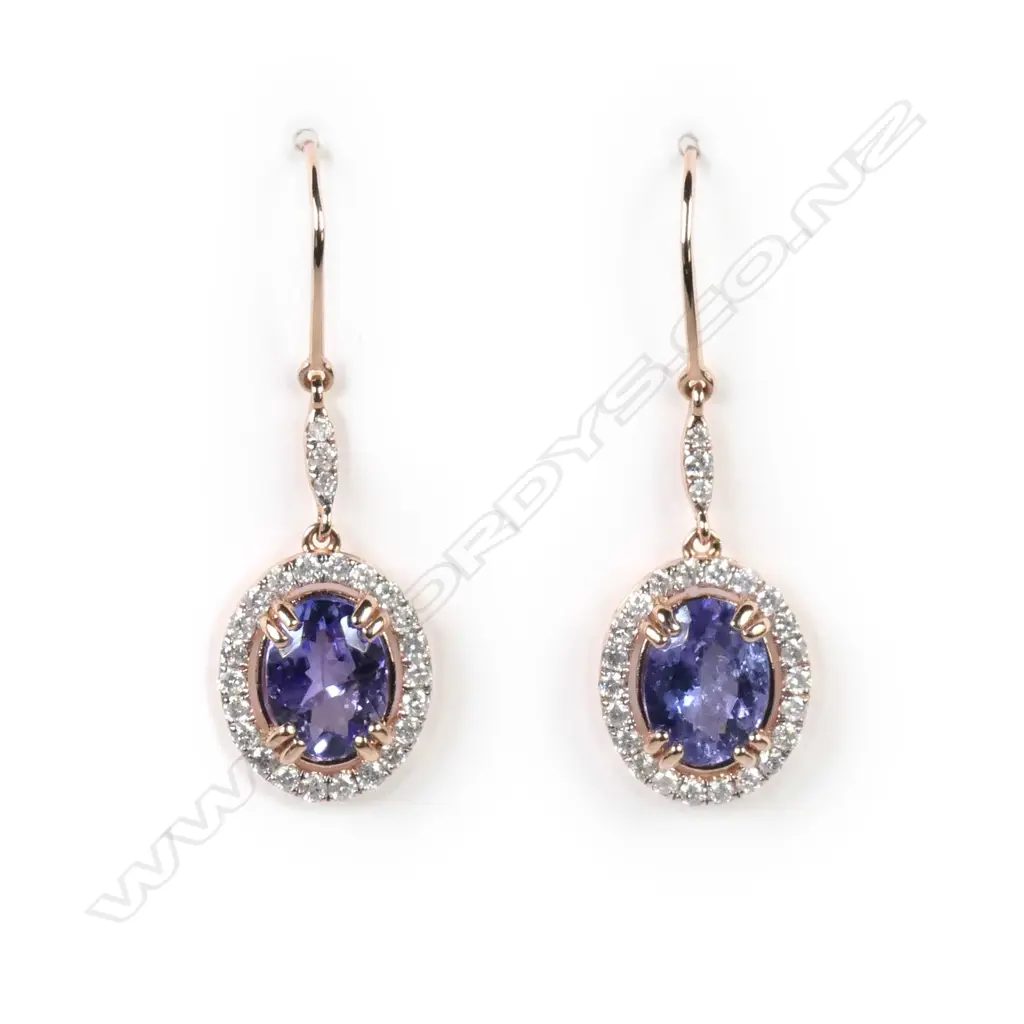 A pair of 14ct rose gold tanzanite and diamond drop earrings Image 1++