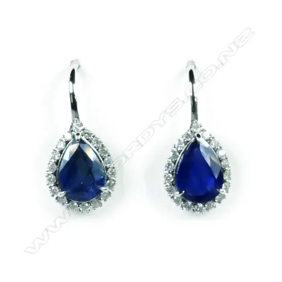 A pair of 14ct white gold sapphire and diamond earrings