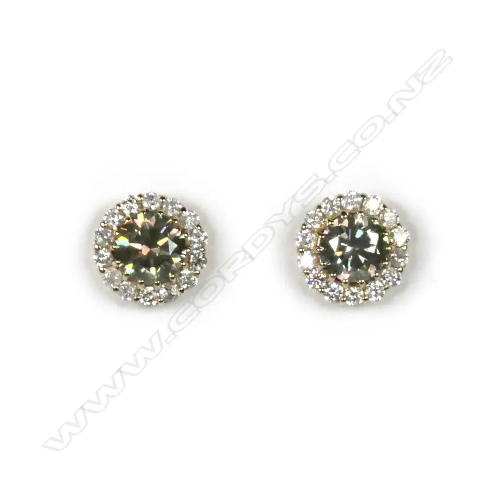 A pair of 14ct gold diamond halo stud earrings Image 1++