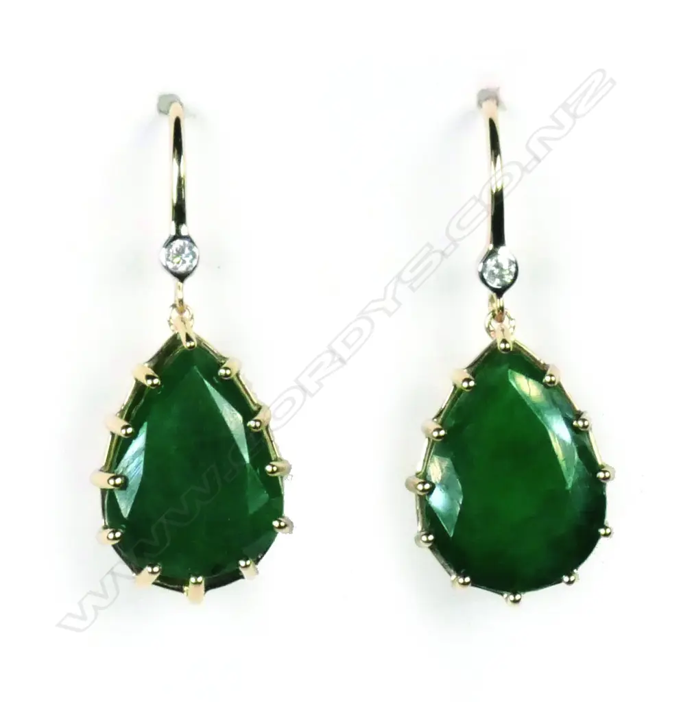 A pair of 14ct gold emerald and diamond earrings Image 1++