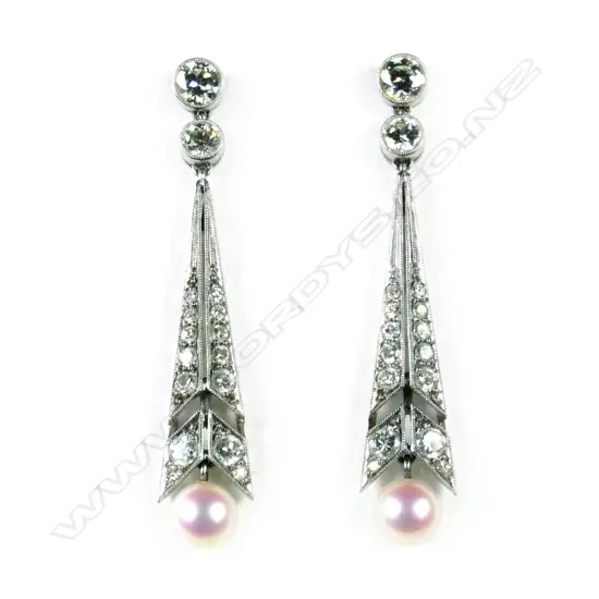 A pair of period platinum Art Deco diamond and pearl earrings
