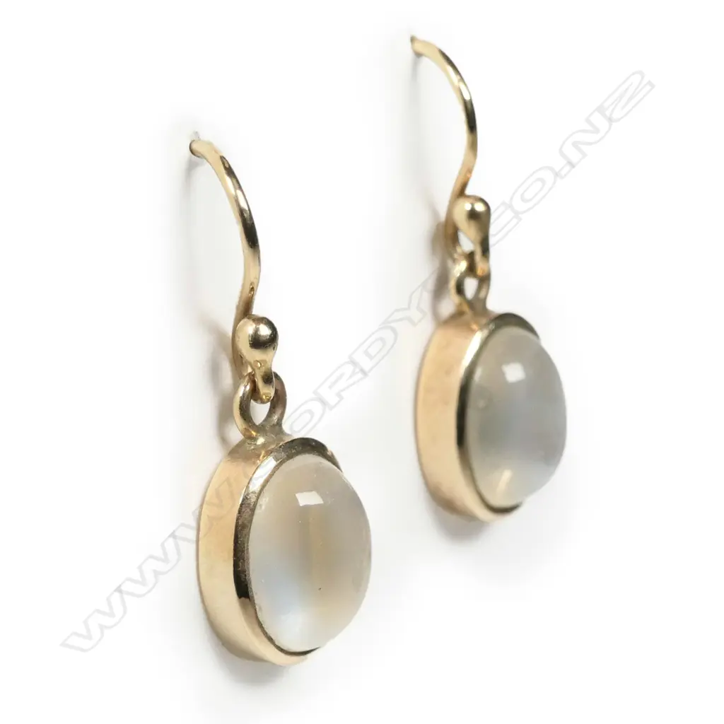 A pair of 9ct gold and moonstone earrings Image 1++