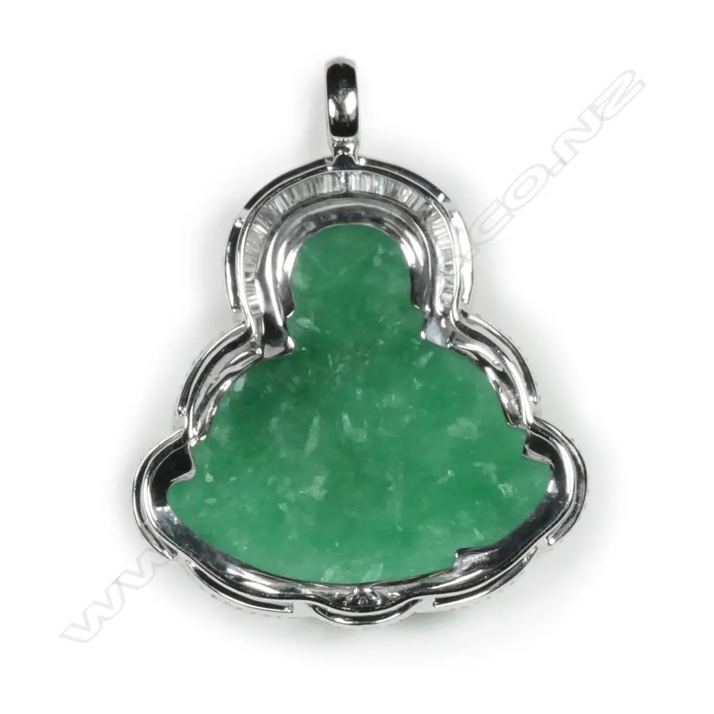 An impressive 18ct white gold jadeite and diamond Buddha pendant Image 1++